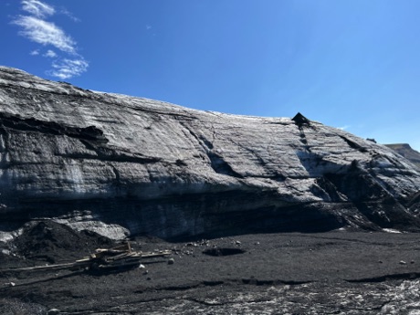 glacier ice with dirt dredged up